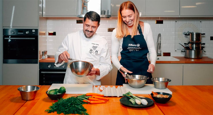 Chef Charles and an athlete in the kitchen