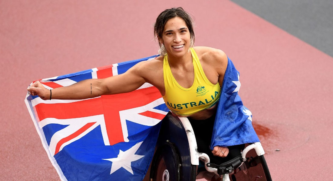 Madison de Rozario wrapped in an Australian flag